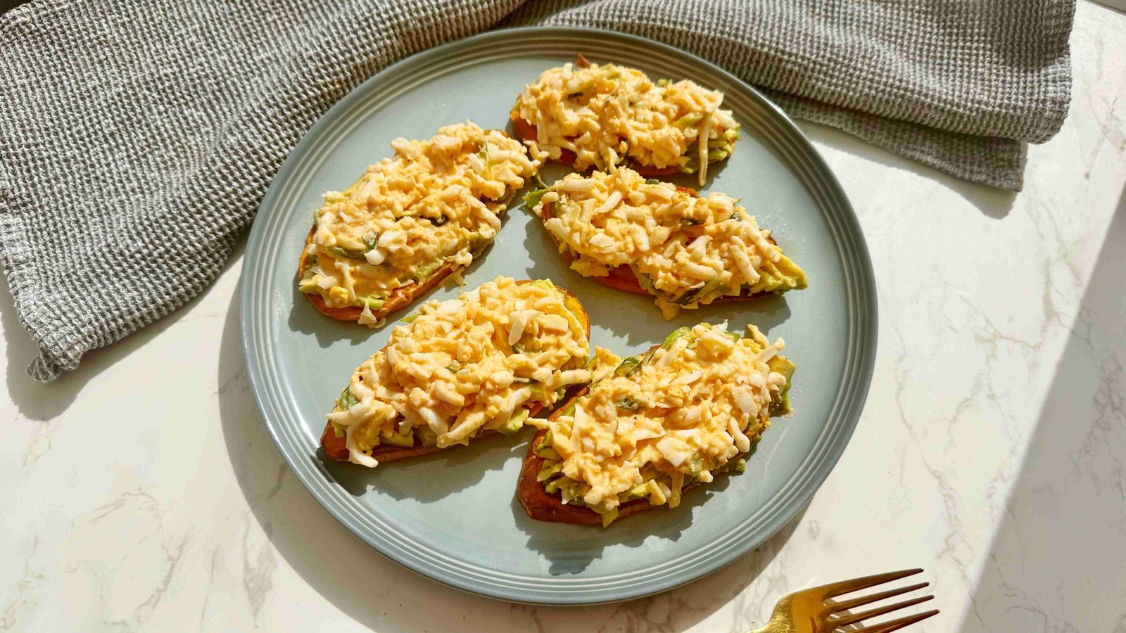 Grated Egg Sweet Potato Toast served on a plate