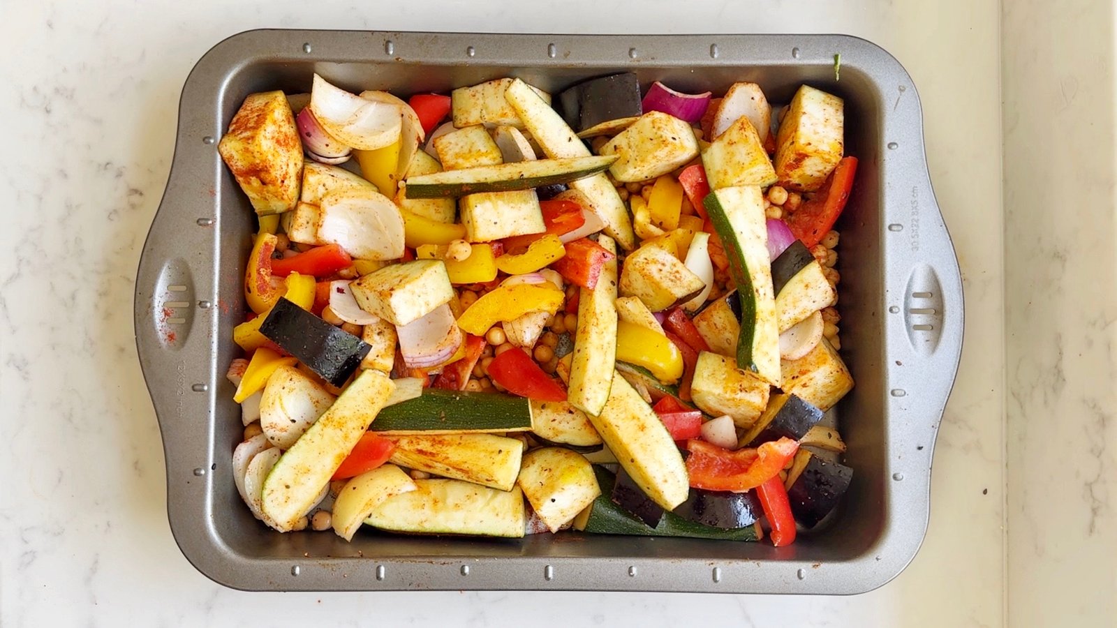 Mediterranean roasted vegetable salad, vegan chickpea salad, tahini vegetable bowl, healthy meal prep salad, gluten-free roasted salad, plant-based Mediterranean recipe, roasted aubergine salad, tahini dressing salad recipe 