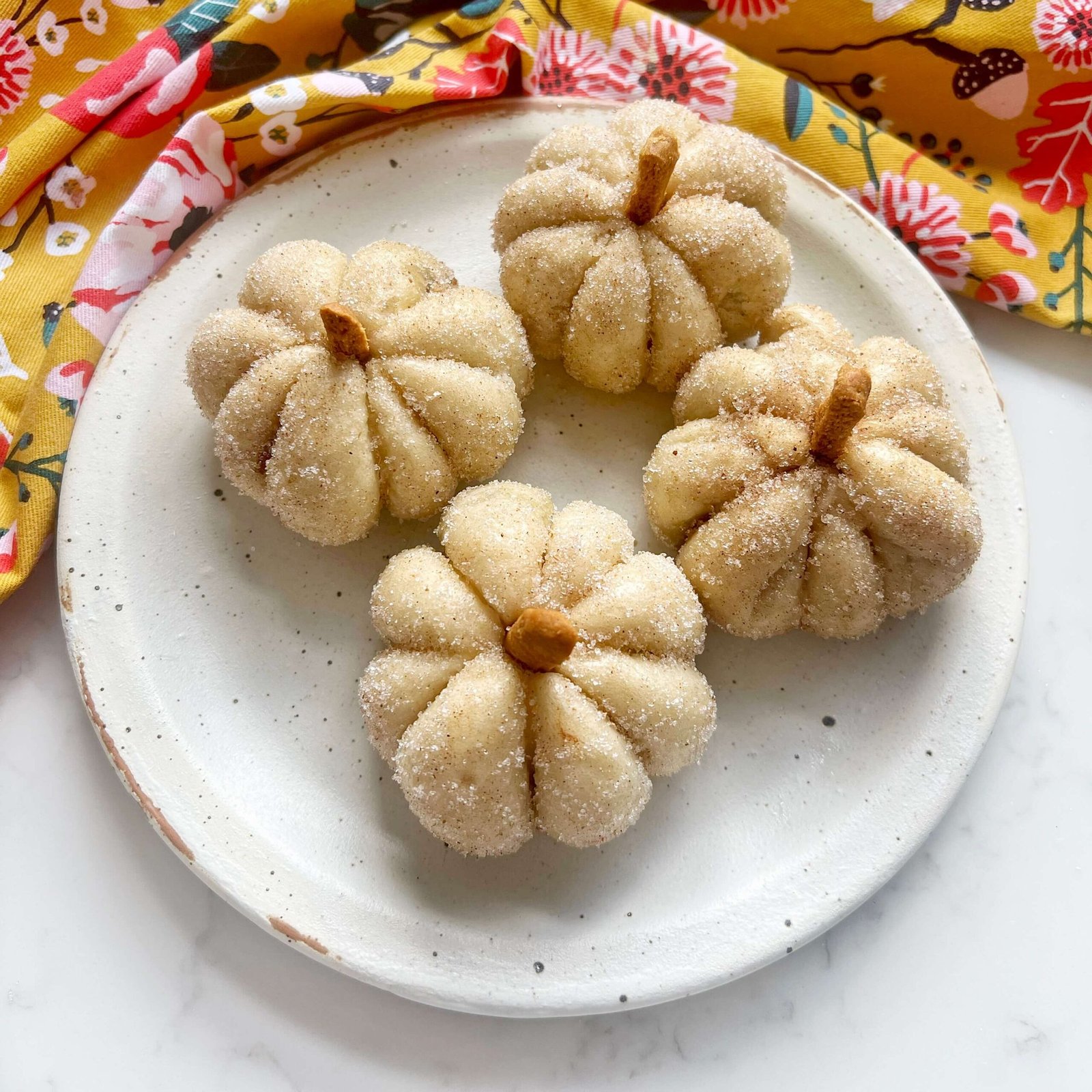 Pumpkin Spice Steamed Buns served on a plate