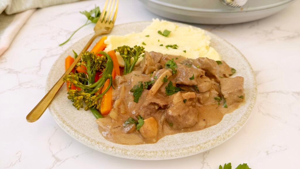 plate of food with Healthy Slow Cooker Beef Stroganoff