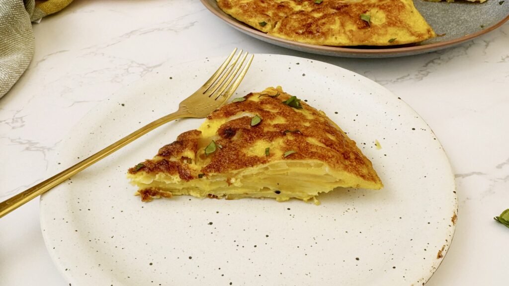 a plate with a tortilla made with eggs and potato