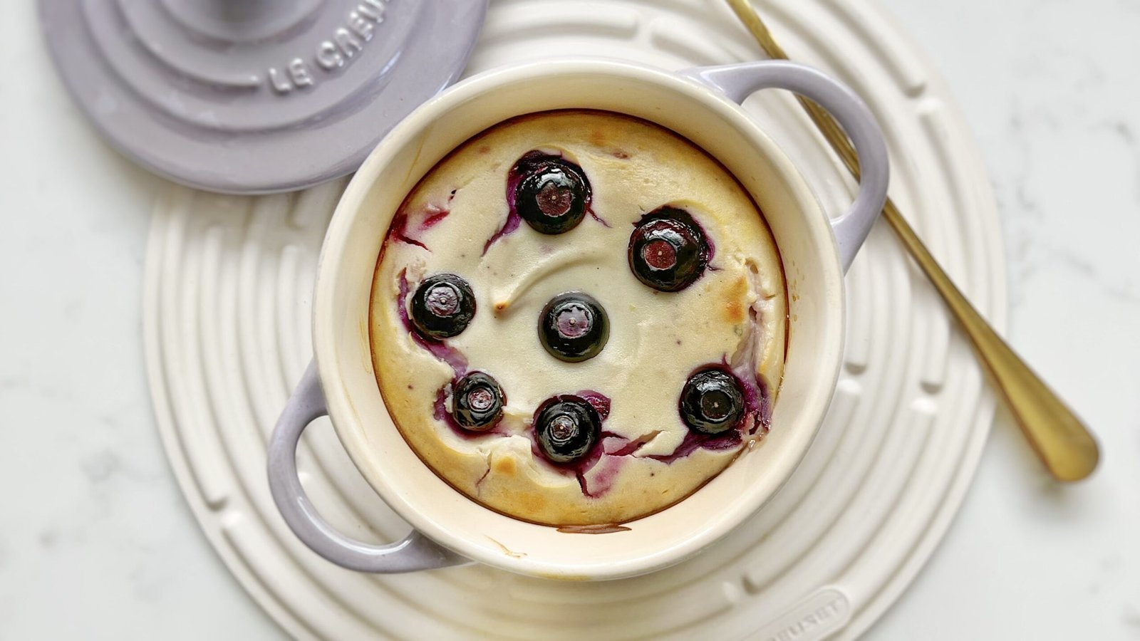 a blueberry yoghurt cake in a pot