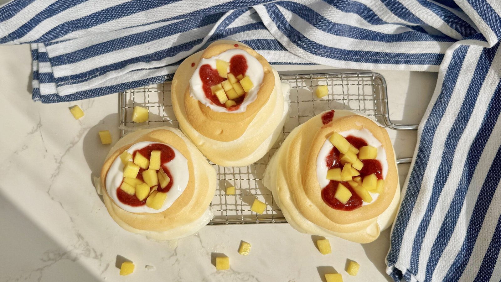 mini pavlova recipe, mango pavlova, cherry coulis dessert, healthy pavlova, Skyr yoghurt dessert, low sugar pavlova, high protein dessert, summer pavlova, gluten free pavlova, fruit pavlova