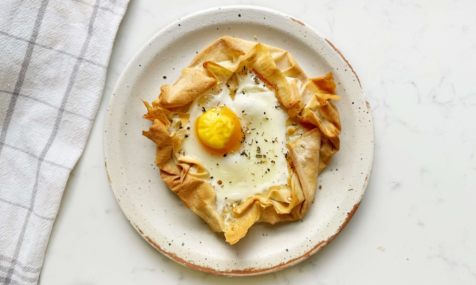Cheesy Egg Filo Pastry shown from above served on a plate