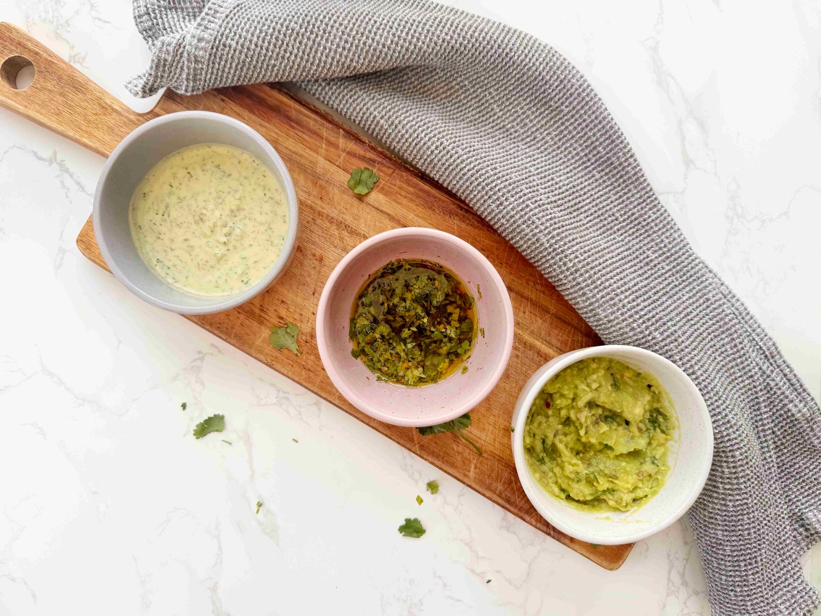 3 South American steak sauces served in bowls.