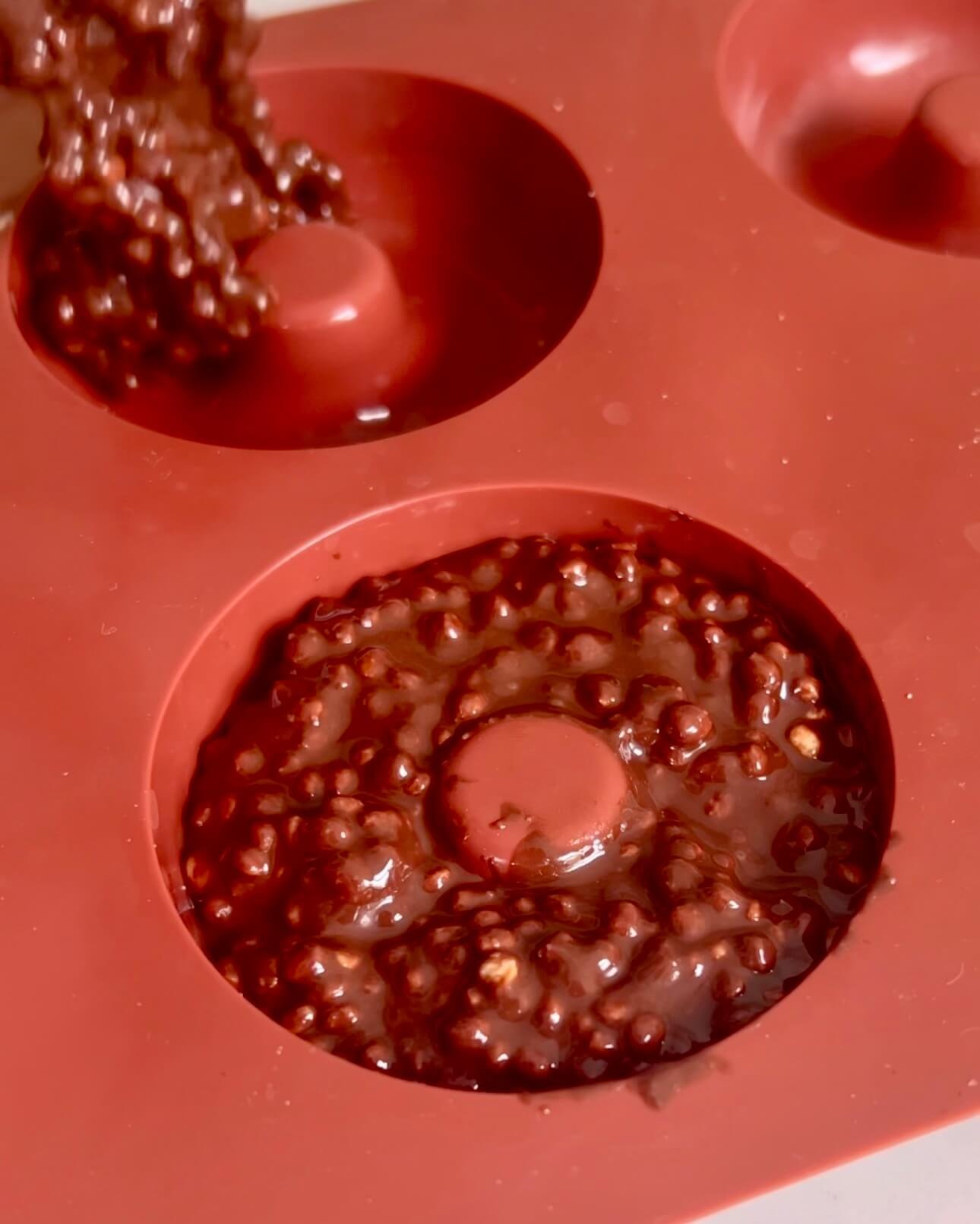 No Bake Crunchy Chocolate Donuts - mix added to moulds