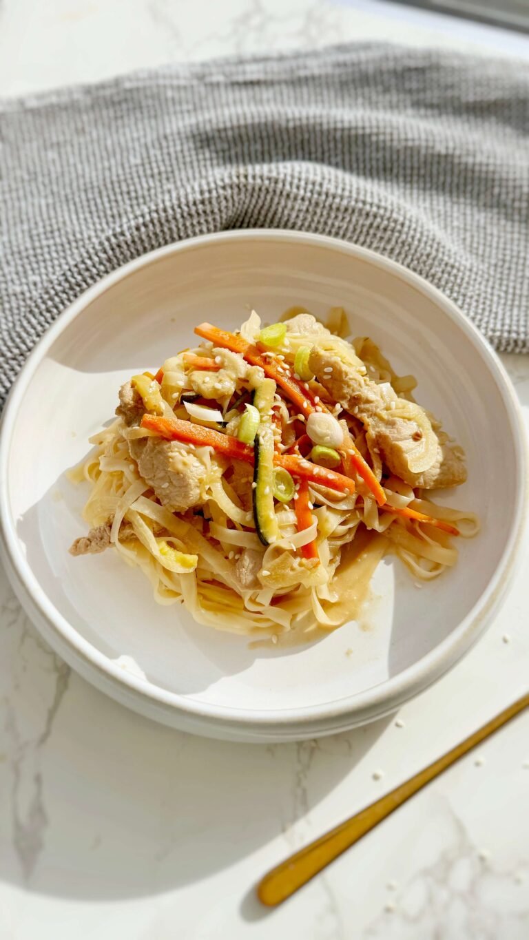 Slow Cooker Creamy Miso Pork Noodles served in a bowl