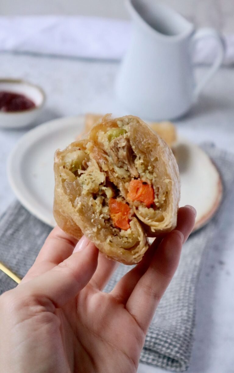Crispy Roast Dinner Spring Rolls cut in half showing filling