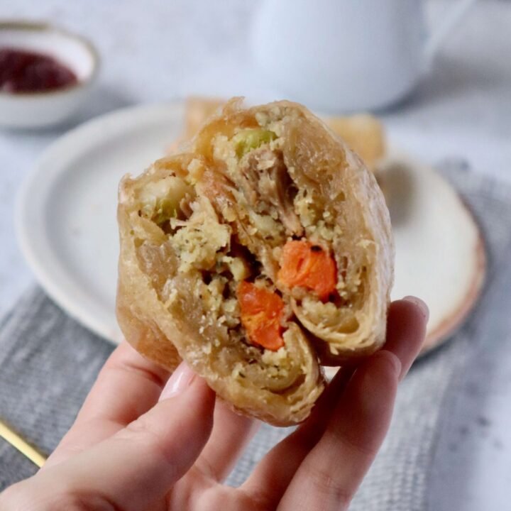 Crispy Roast Dinner Spring Rolls cut in half showing filling