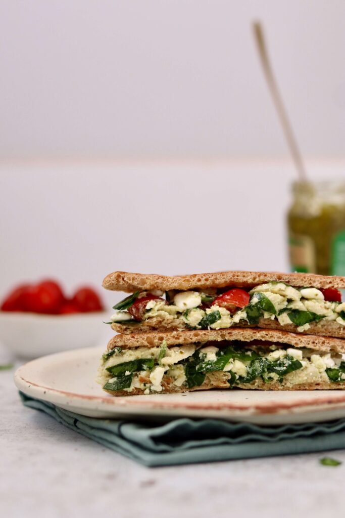 Pesto Chicken Cottage cheese Sandwich cur in half showing filling