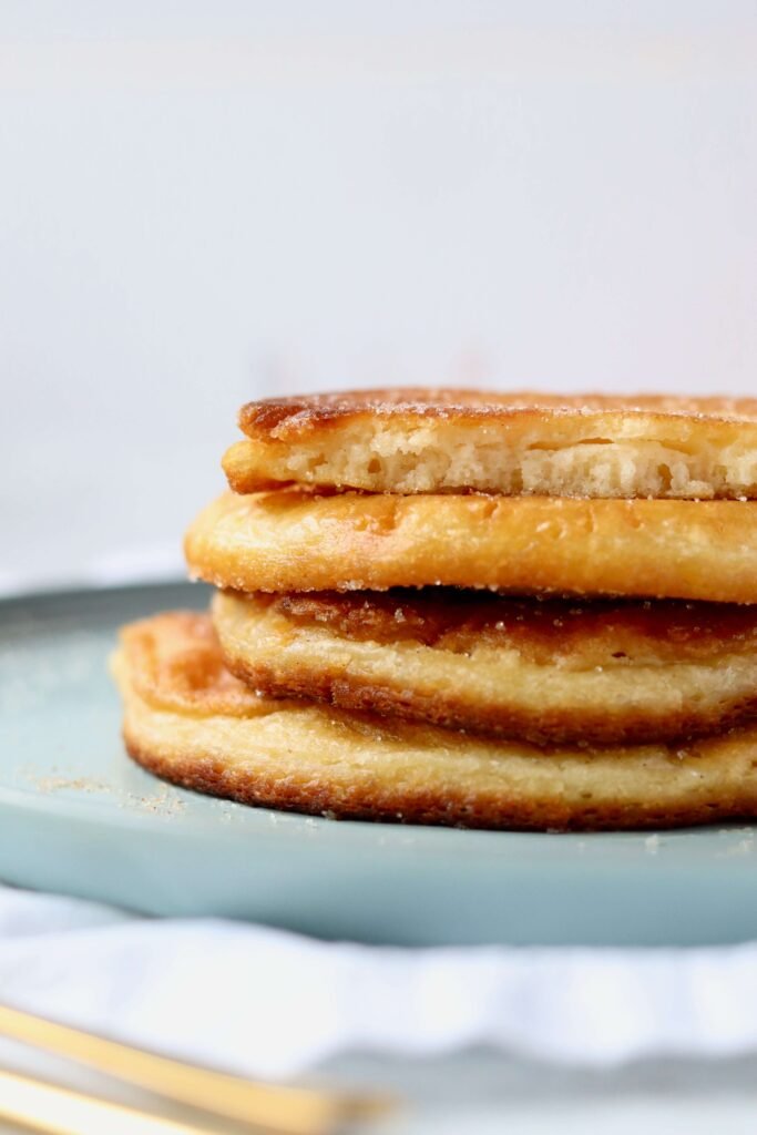 Colombian Arepuelas (Fried Pancakes) close up from the side