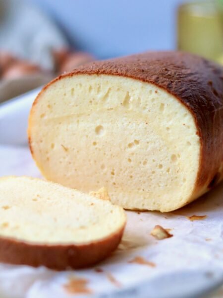 Cottage cheese bread loaf with a slice cut