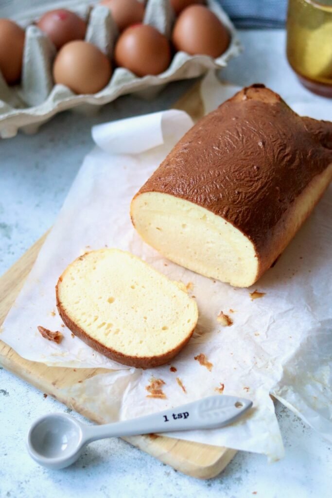 High protein cottage cheese bread loaf with eggs in the background
