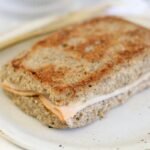 Microwave keto bread with chia seeds made into a cheese and turkey toastie
