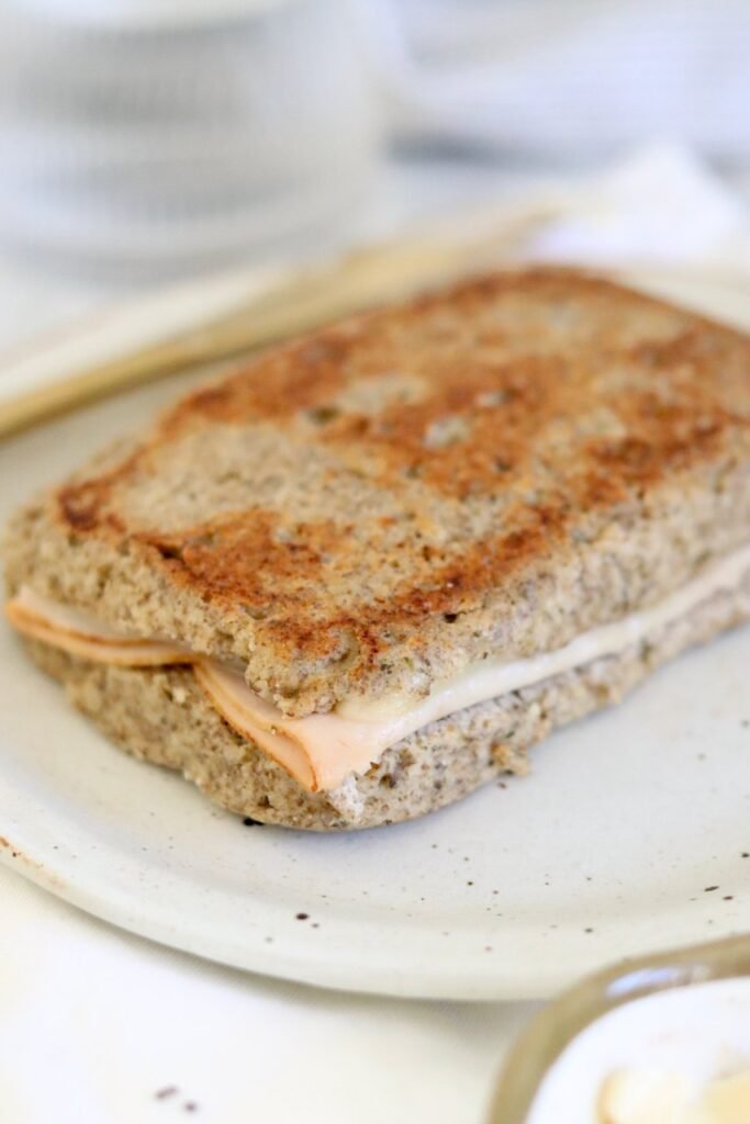 Microwave keto bread with chia seeds made into a cheese and turkey toastie