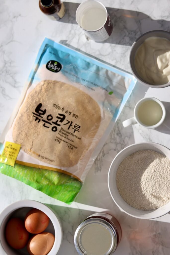 Ingredients for konggaru pancakes: roasted soybean powder, oat flour, Greek yogurt, eggs, almond milk and honey